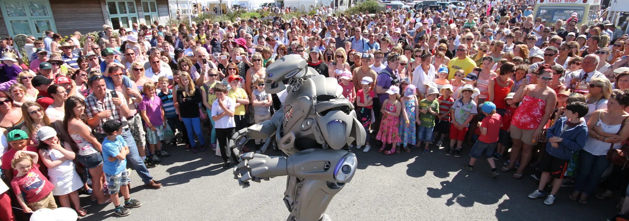 titan the robot hero image. Standing outside in front a a huge crowd at the royal cornwall show.