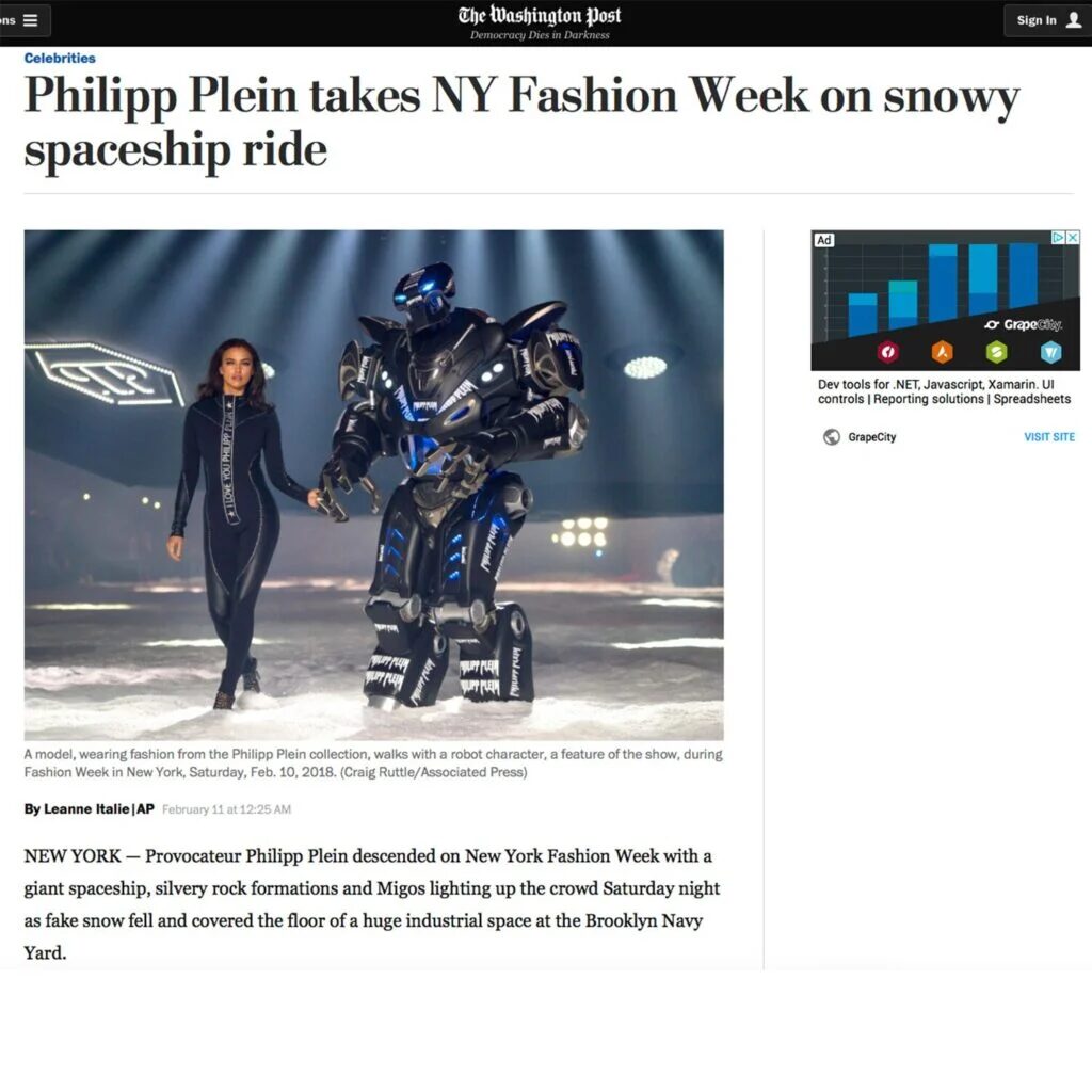 A web article for the Washington post features titan the robot, walking a snowy catwalk at the New York fashion week, with the supermodel Irina Shayk