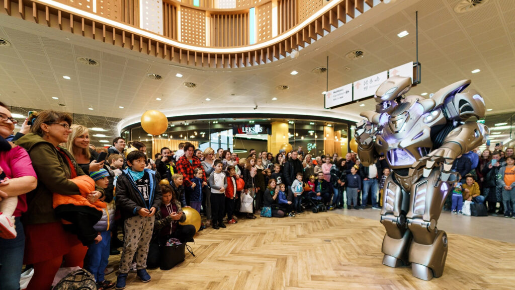 shopping mall crowd gathered titan the robot