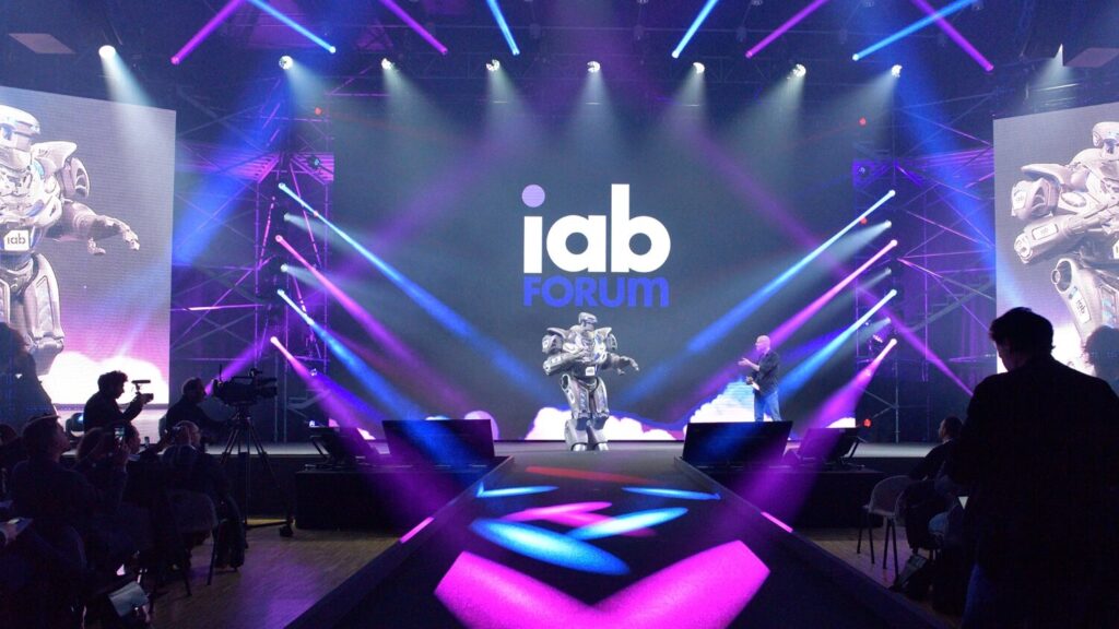 titan corporate iab forum on stage