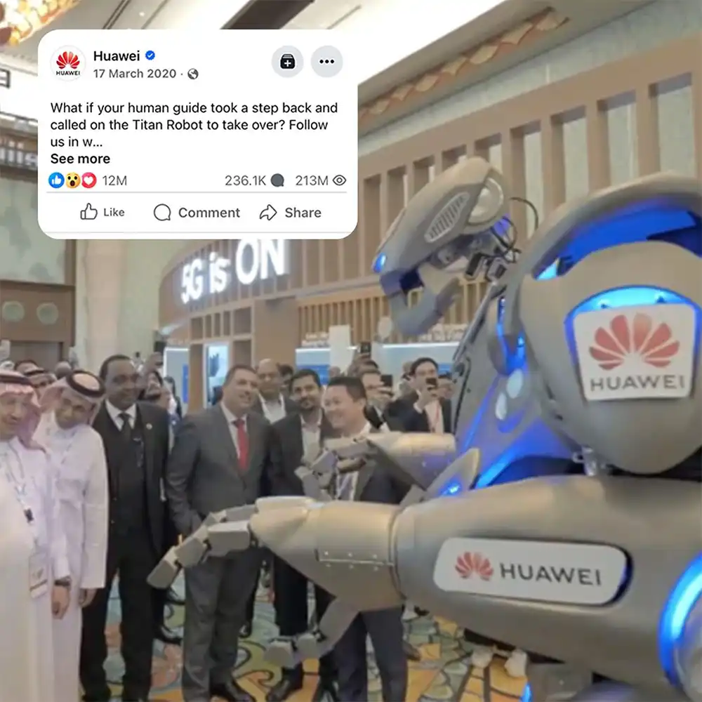 Titan the Robot stands in front of corporate professionals, branded with the huawei logo. An infographic states the video has over 200 million views
