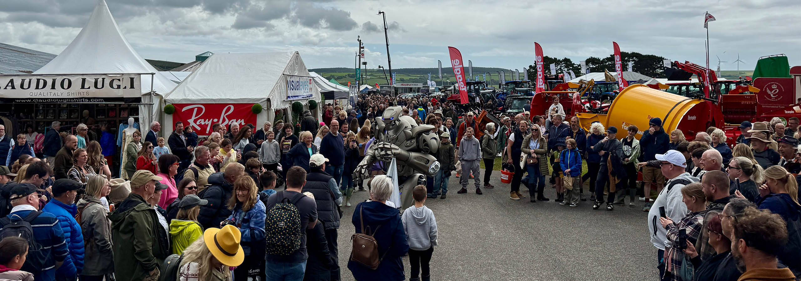 A large crowd has gathered at the royal cornwall show to see a roaming version of titan the robots show