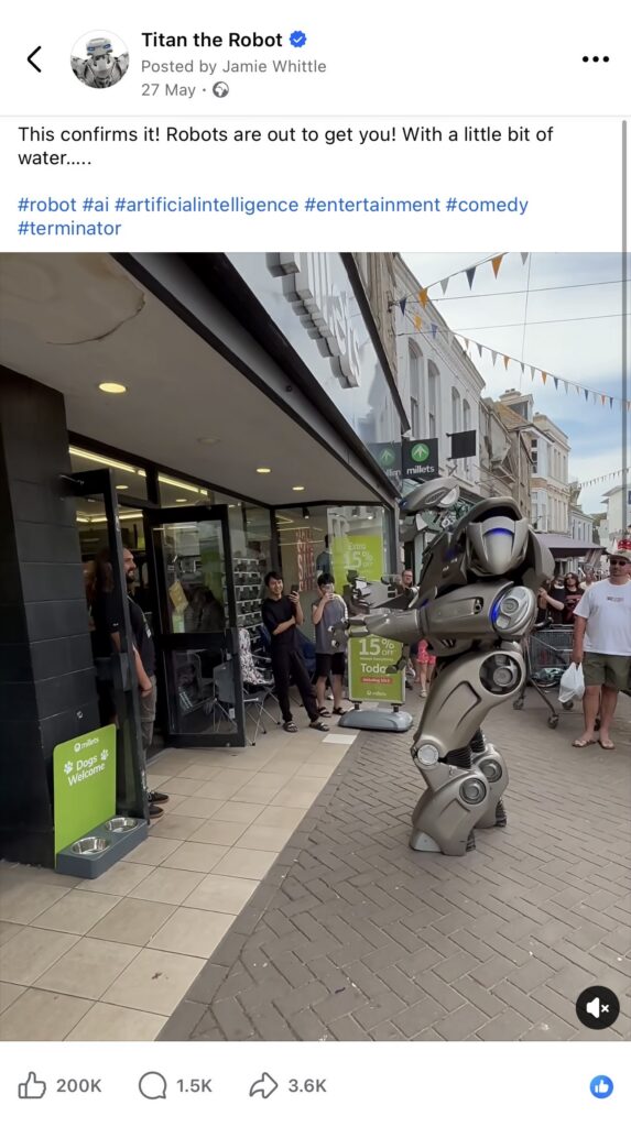 Screenshot of a Titan the Robot video of Titan in Newquay high street, posted onto Facebook. With a large amount of comments, likes and shares